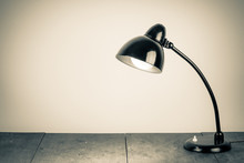 Vintage Background With Lighting Retro Desk Lamp On Wood Table