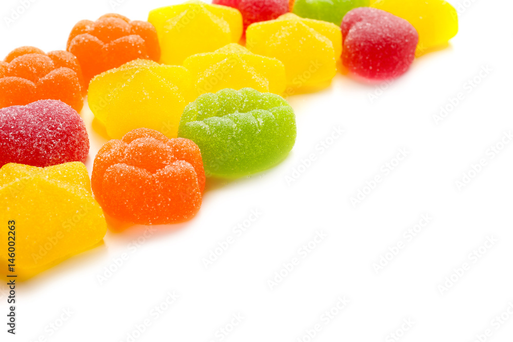 Tasty jelly candies on white background