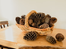 Pinecones In A Wicker Basket