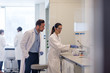 © ReeldealHD images - Female student scientist working on an experiment
