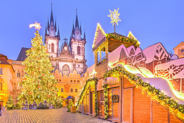 Christmas tree and fairy tale Church of our Lady Tyn in Prague, Czech Republic.