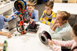 © Syda Productions - happy children with 3d printer at robotics school