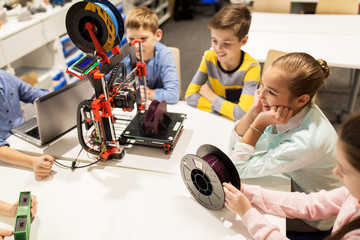 Wall Mural - happy children with 3d printer at robotics school