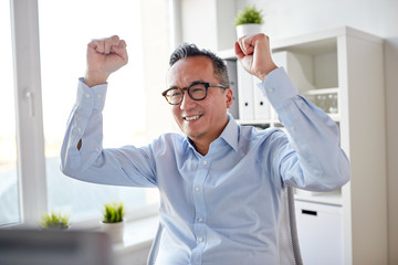 Sticker - happy businessman celebrating victory at office