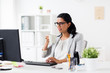 © Syda Productions - businesswoman drinking coffee at office computer