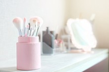 Pink Brush Set In Package On Cosmetic Dressing Table For Makeup