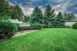 © nazarovsergey - Landscape formal, front yard is beautifully designed garden.