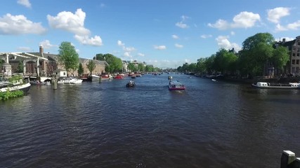 Sticker - AMSTERDAM, NETHERLANDS - JULY 2, 2016 : View of popular Amsterdam canals with historical houses. Amsterdam is a touristic city.