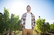 © WavebreakMediaMicro - Thoughtful young man standing at vineyard