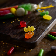 Wall Mural - candies on a wooden chopping board