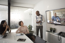 Business People Video Conferencing In Meeting