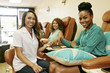 © Peathegee Inc/Blend Images - Portrait of business owner and customers in nail salon