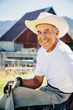 © Inti St Clair/Blend Images - Portrait of smiling Caucasian farmer