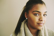 © Peathegee Inc/Blend Images - Portrait of serious Mixed Race woman