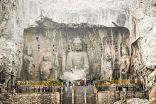 Cliff Stone Carving Buddha Statue At Longmen Grottoes, Luoyang, Henan, China