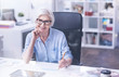 © zinkevych - Friendly female sitting at her workplace