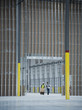 © Erik Isakson/Blend Images - Workers with boxes on hand truck in warehouse