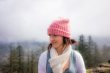 Fototapeta  - A woman in a winter cap in Eugene, OR