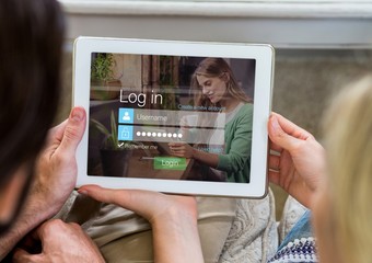 Wall Mural - couple with tablet in login screen