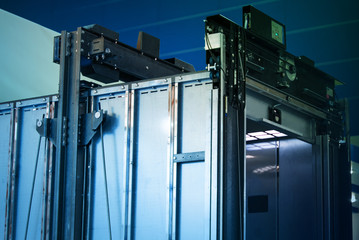 Elevator Installation, Lift Technician Installing a Modern Elevator