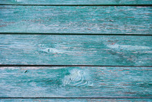 Grunge Wooden Background With Green Peeling Paint.