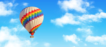Hot-air Balloon And Blue Sky And White Clouds