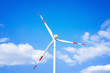Renewable energy sources. Wind generators in the clear blue sky. Ecology concept.
