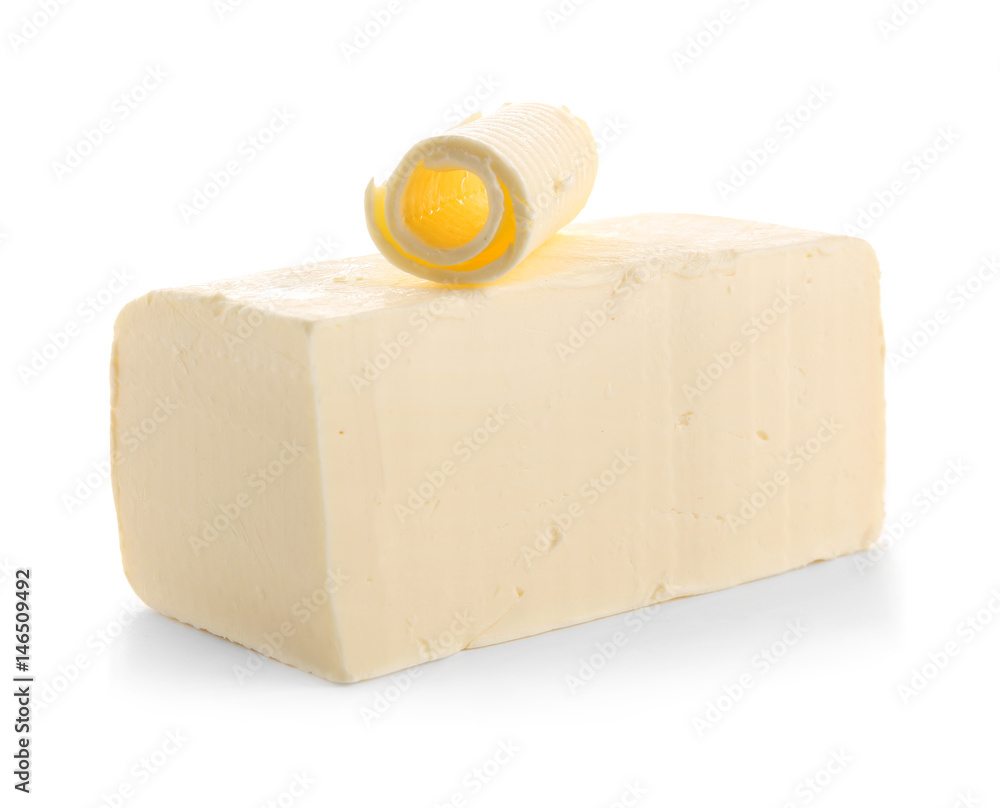 Piece of butter on white background
