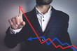 © andranik123 - Businessman with profit chart.