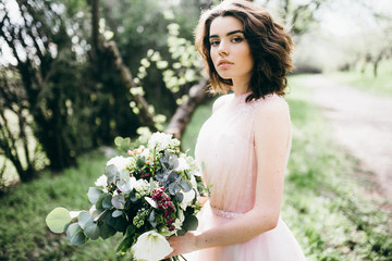 Wall Mural - Portrait of beautiful bride in the park