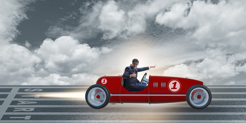 Wall Mural - Businessman riding vintage roadster in motivation concept