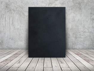 Blank long black fabric canvas frame leaning at concrete wall on wooden plank floor in perspective room,Business mock up presentation design