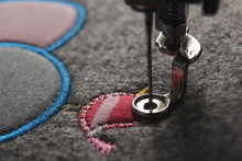 Embroidery And Application With Embroidery Machine - Foundation For Satin Stitch - Background And Foreground Blanked Out Blurry, Matte Look