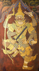 Wall Mural - Traditional Thai painting art about Ramayana story on display at the temple wall Wat Prakaew  in Bangkok, Thailand.