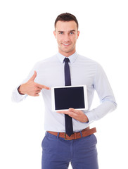 Wall Mural - Businessman in blue shirt shows touch screen. Isolated on white background