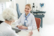 © Yakobchuk Olena - Affable glance of female doctor