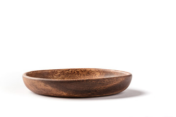 Side view of acacia wood plate on a white background