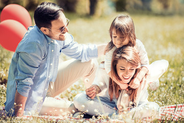 Happy family having fun outdoors