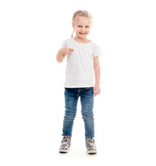 Wall Mural - Tiny girl standing pointing at herself, isolated