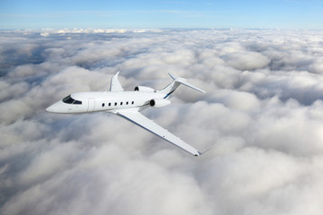 Private business jet airplane flying on a high altitude.