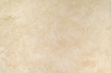 textured background. decorative plaster walls, external decoration of facade. texture of beige.