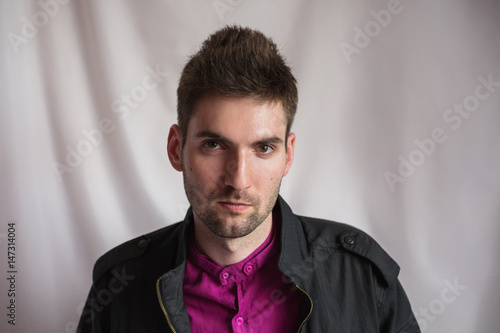 Young Attractive Cheerful Man With Dark Hair With A Beard In