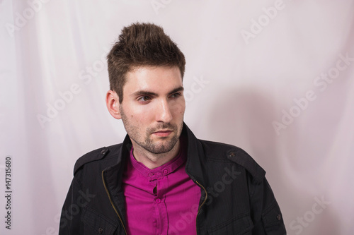 Young Attractive Cheerful Man With Dark Hair With A Beard In A