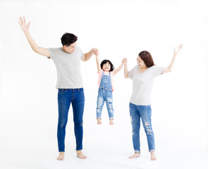 happy asian family standing together isolated on white