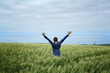 © larisa - the boy in the blue sweater in the wheat field