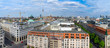 Berlin skyline panorama with famous TV tower at Alexanderplatz and construction cranes at Museum island as seen from the French Dome at Gendarmenmarkt, Germany