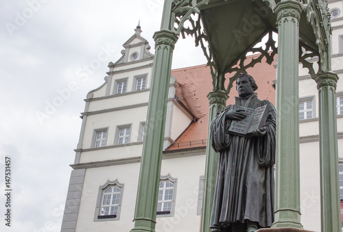 Fotografie, Obraz Martin Luther / Sculpture of the reformer Martin Luther in Wittenberg