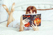 © venerala - a girl with a book on the bed