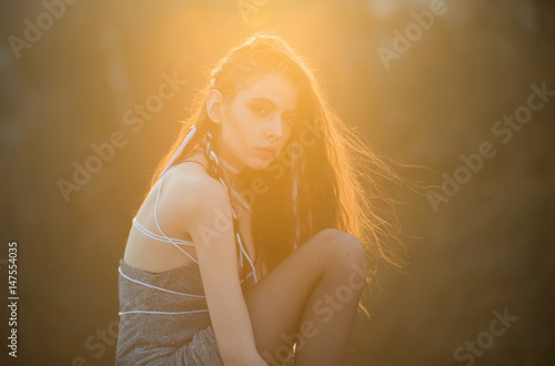Girl With Long Fashionable Indie Hairstyle On Natural Background