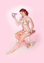 Pin-up Girl In Lingerie With Hair Dryer